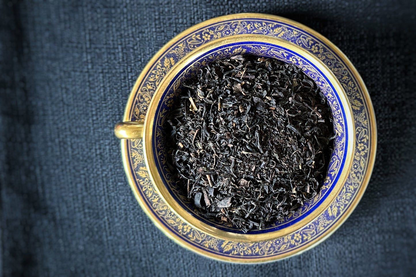 Teacup full of black tea