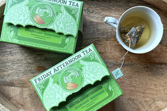 two boxes labeled 2025 tea advent calendar beside teacup with compostable teabag