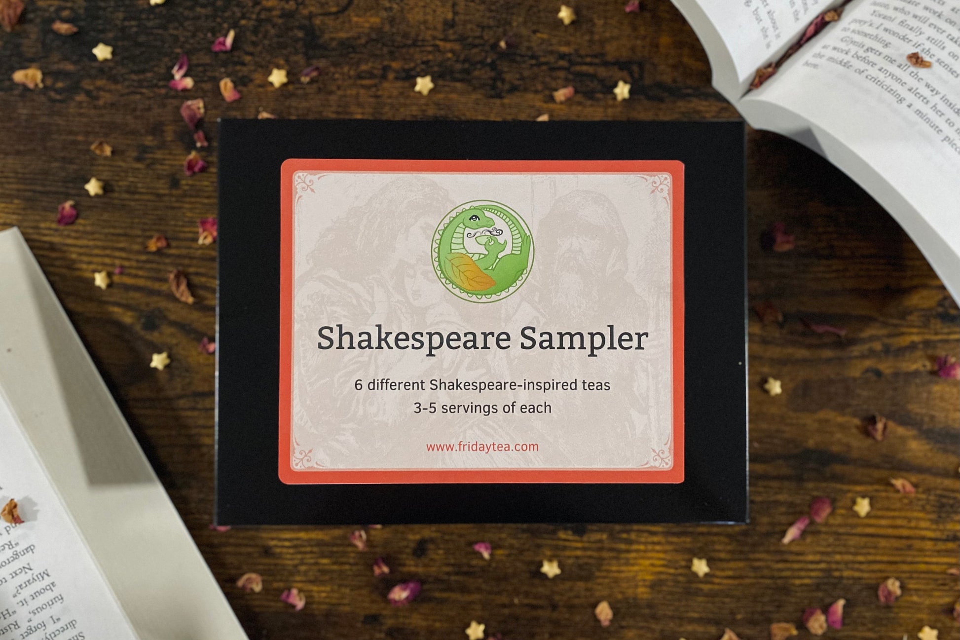 Shakespeare Sampler packaging on a wooden surface with books and tea leaves.
